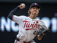 Joe Ryan pitches for the Twins in the seventh inning Monday at Target Field.