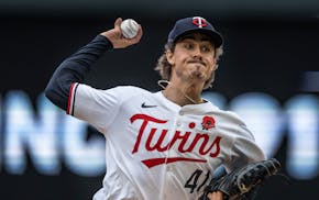 Joe Ryan pitches for the Twins in the seventh inning Monday at Target Field.