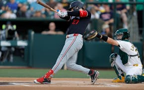 The Twins' Ryan Jeffers hits a solo home run during the first inning against the Athletics on Wednesday night in West Sacramento, Calif.