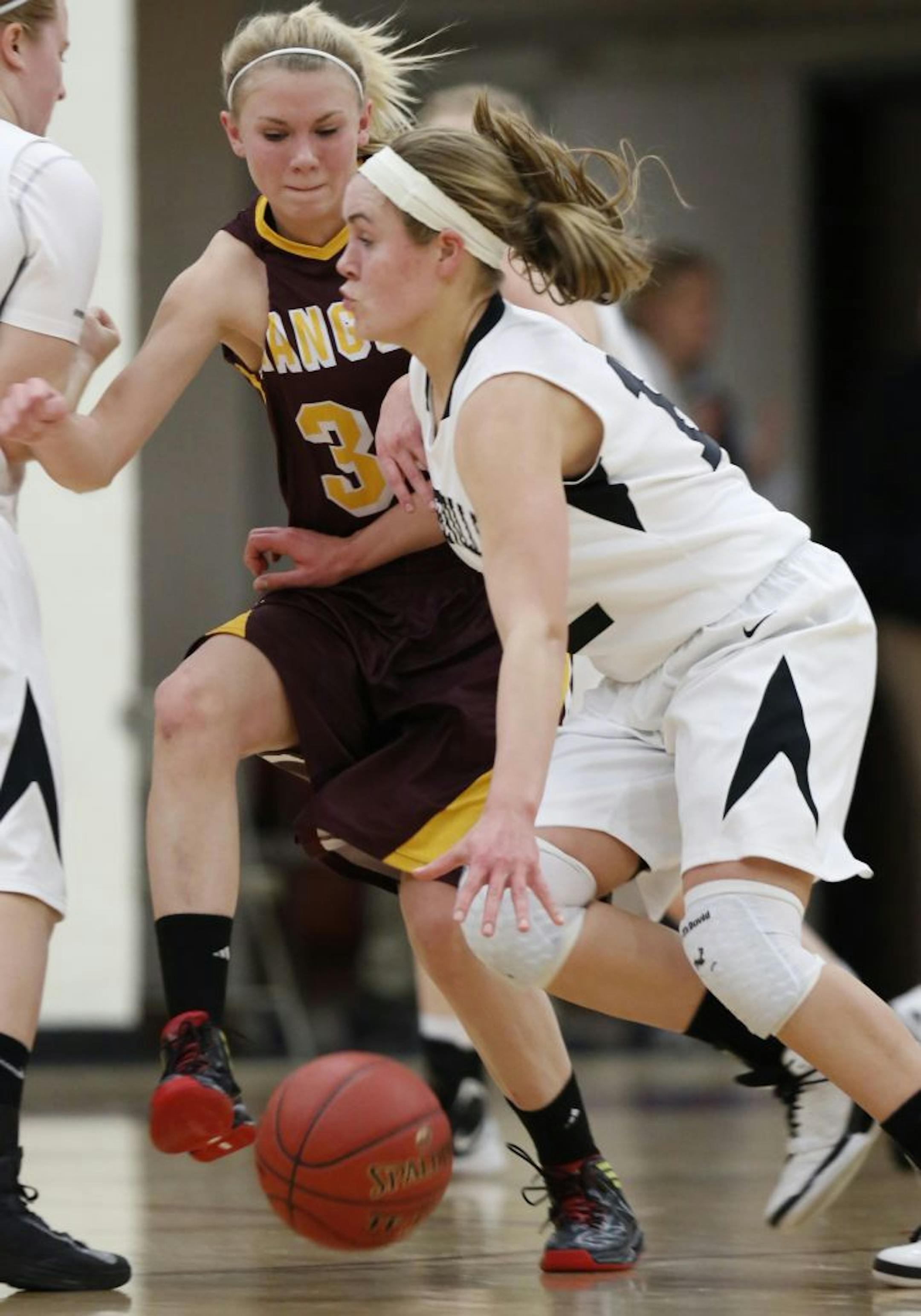 At Forest Lake H.S. in a girls basketball game between Forest Lake and Roseville, Sarah Jab(34) guards Jacqlyn(cq) Poss(12) of Roseville.