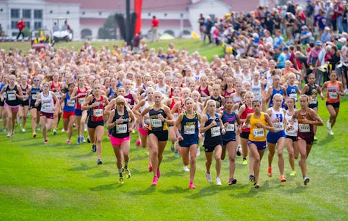 377 runners compete in the Girls' Championship 5K race during the Roy Griak Invitational cross country meet Friday, Sep. 22, 2023, at Les Bolstad Golf Course in St. Paul, Minn. ]