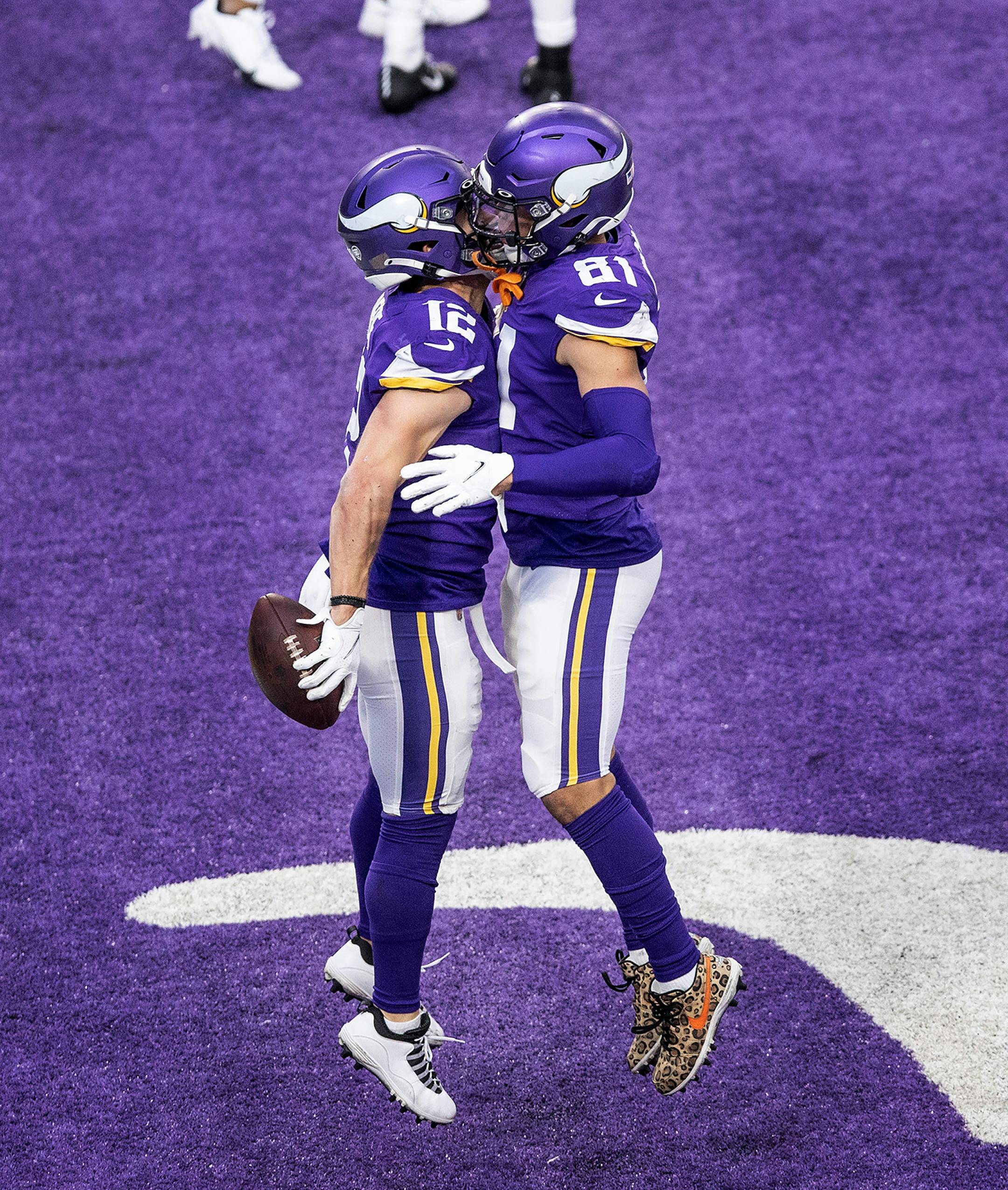 Minnesota Vikings wide receiver Chad Beebe (12) celebrated his winning fourth quarter touchdown catch with Minnesota Vikings wide receiver Bisi Johnson (81).