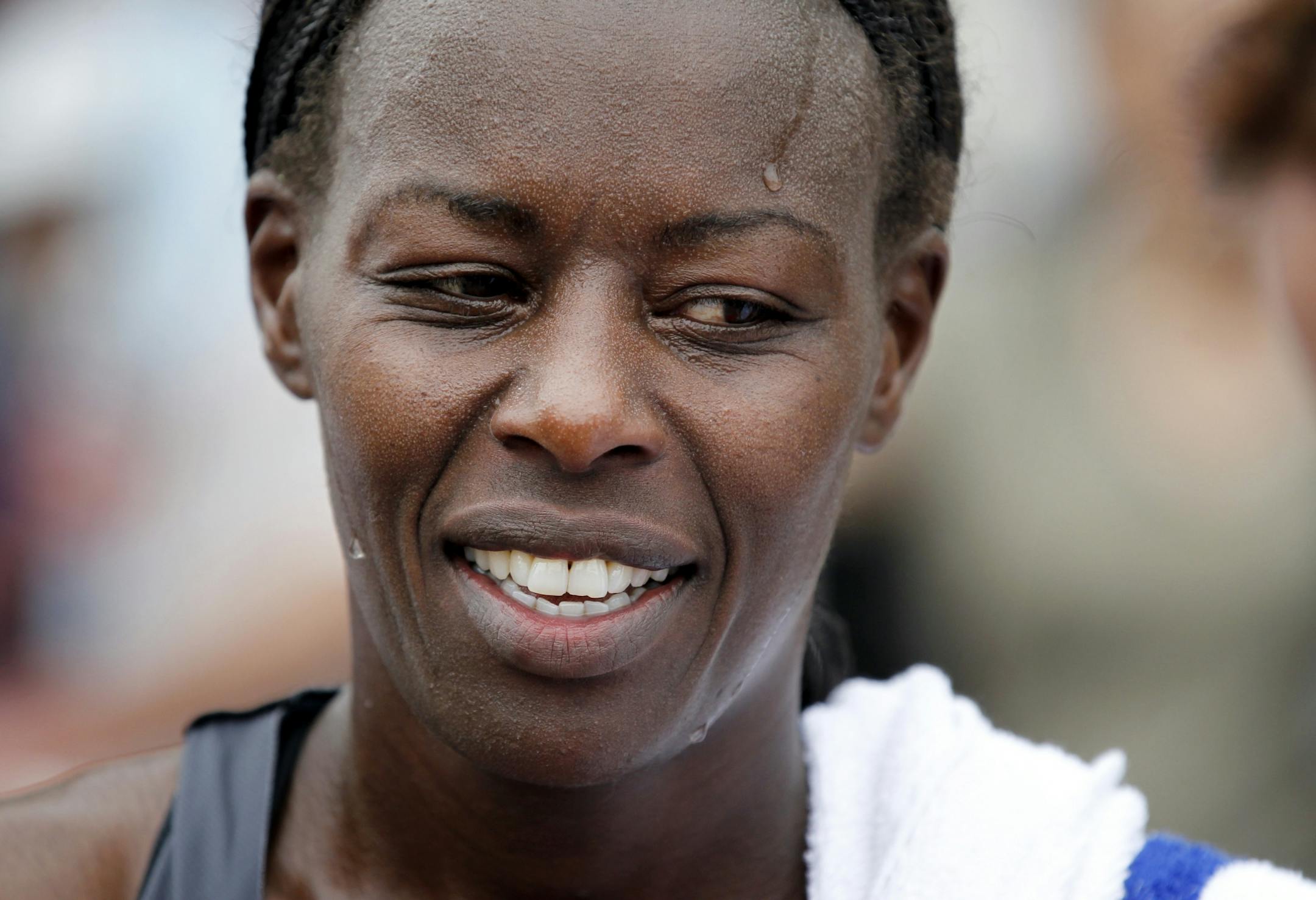 Everlyen Lagat caught her breath after winning the women's division of the Grandma's Marathon with a time of 2:33:13 on Saturday.