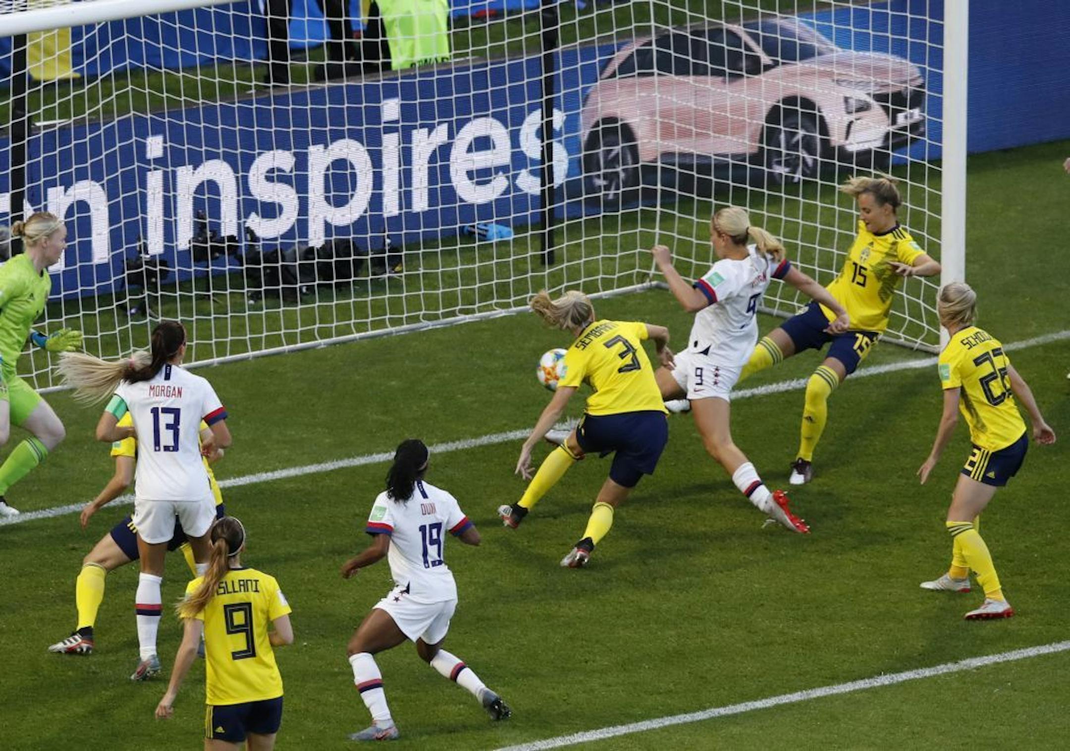 United States' Lindsey Horan, third right, scores opening goal during the Women's World Cup Group F soccer match between the United States and Sweden at the Stade Oceane in Le Havre, France, Thursday, June 20, 2019.