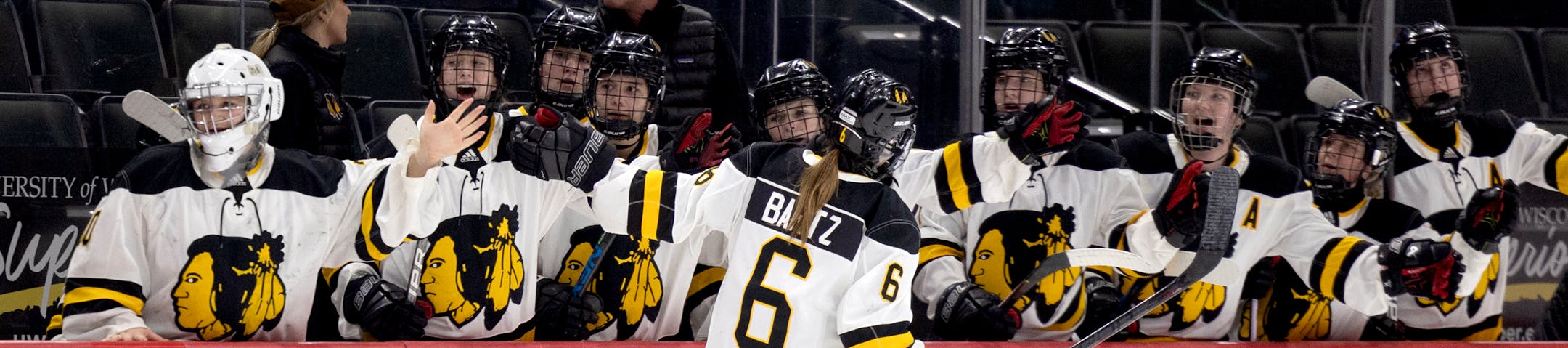 Rylee Bartz (6) of Warroad celebrates with teammates after scoring a goal in the first period during the Class 1A quarterfinals.