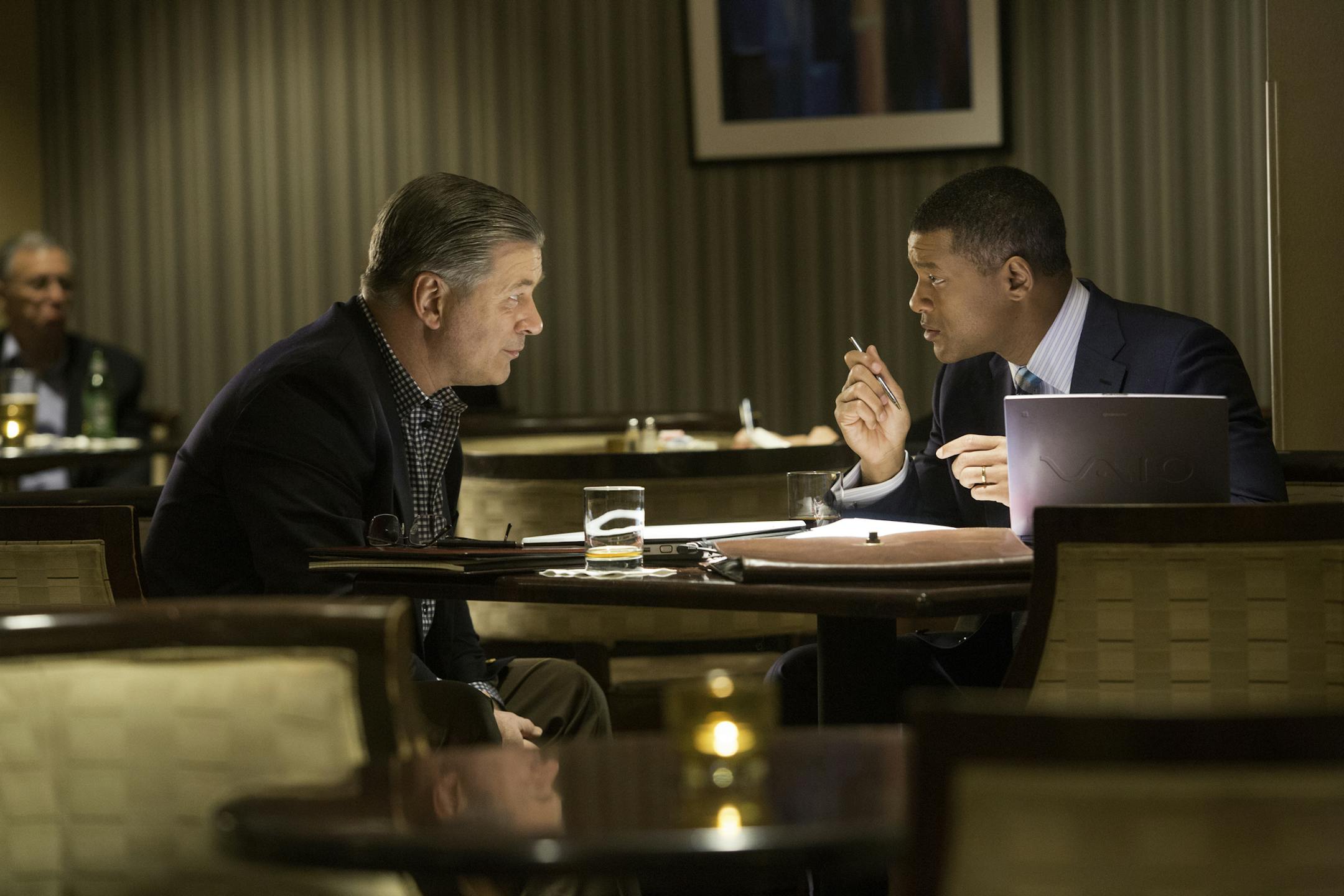 Alec Baldwin , left, and Will Smith star in Columbia Pictures' "Concussion." ORG XMIT: Alec Baldwin (Pending); Will Smi