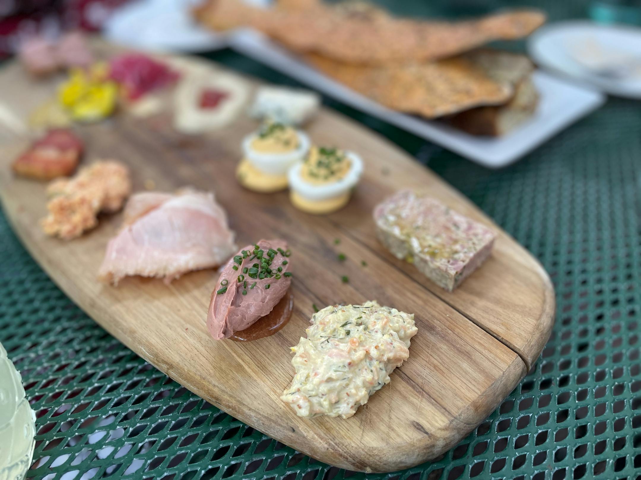 Bungalow Club Charcuterie Platter on the patio