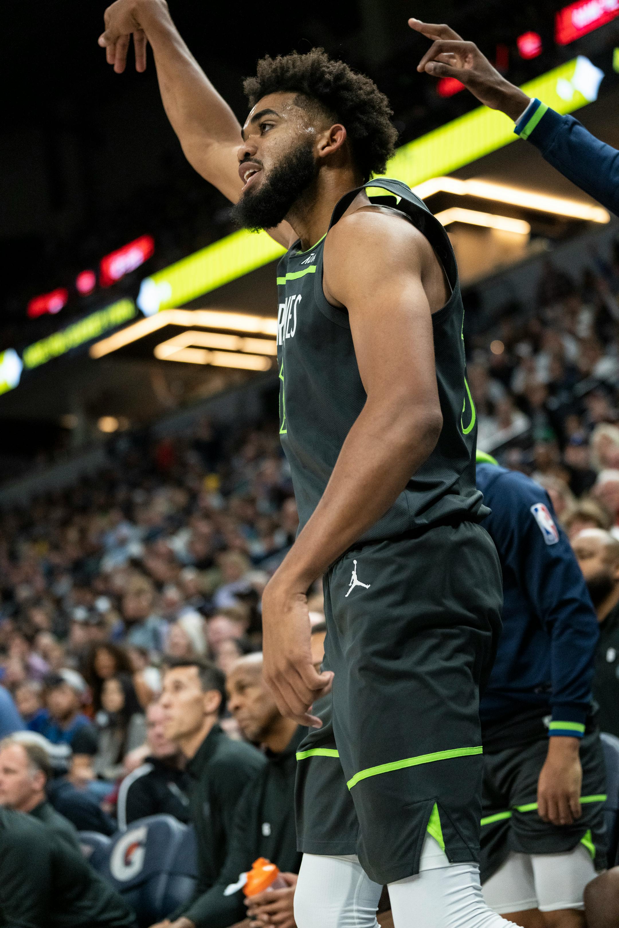Minnesota Timberwolves center Karl-Anthony Towns (32) reacts after getting a three-point shot in the fourth quarter.