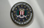 An FBI seal is seen on a wall on Aug. 10, 2022, in Omaha, Neb.