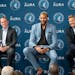 Timberwolves center Rudy Gobert, President of Basketball Operations Tim Connelly, left, and head coach Chris Finch, right, after Gobert was traded to 