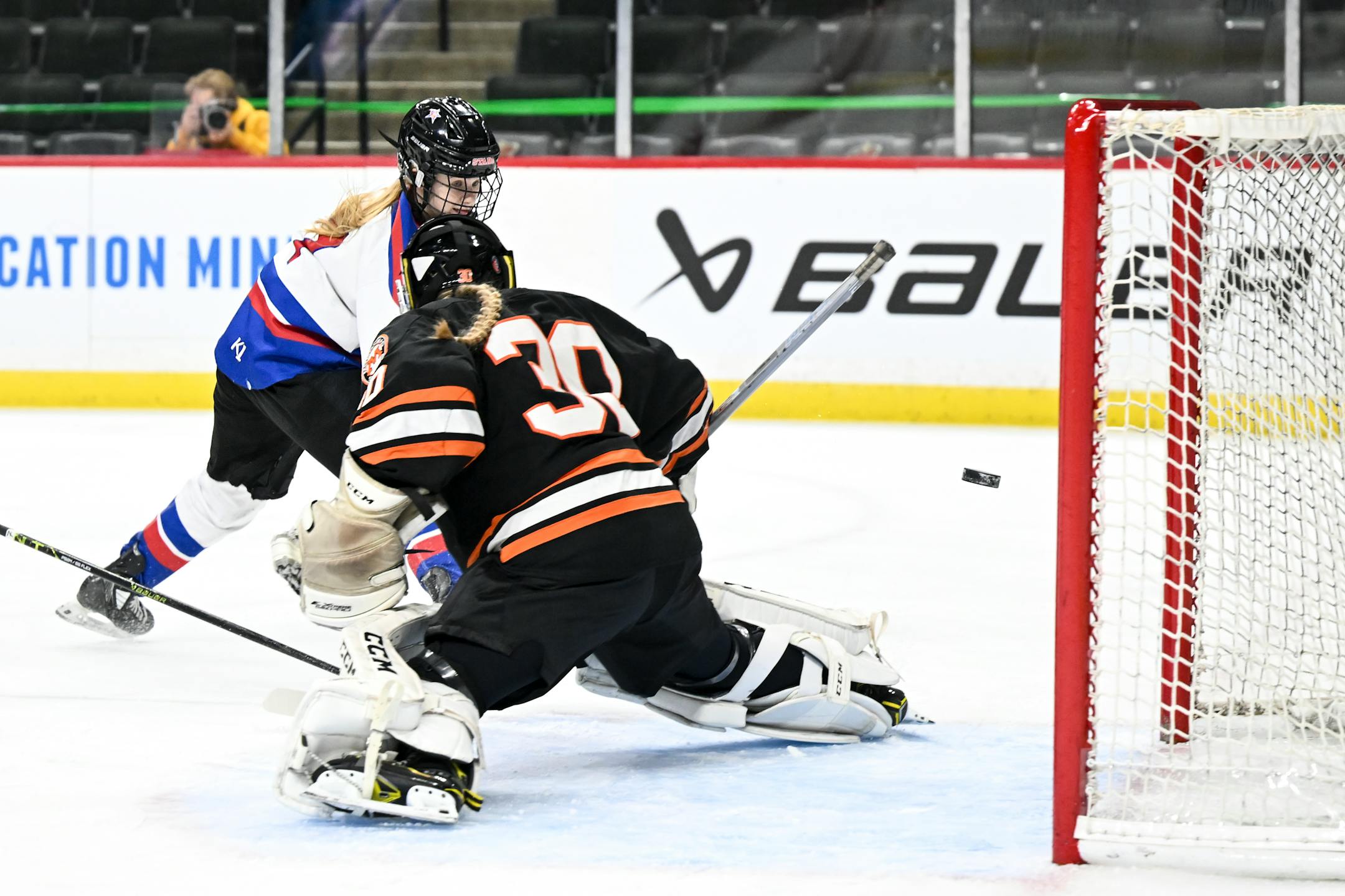 Gentry forward Cara Sajevic (7) scores a goal against Moorhead goaltender Taylor Kressin (30) during the first period.