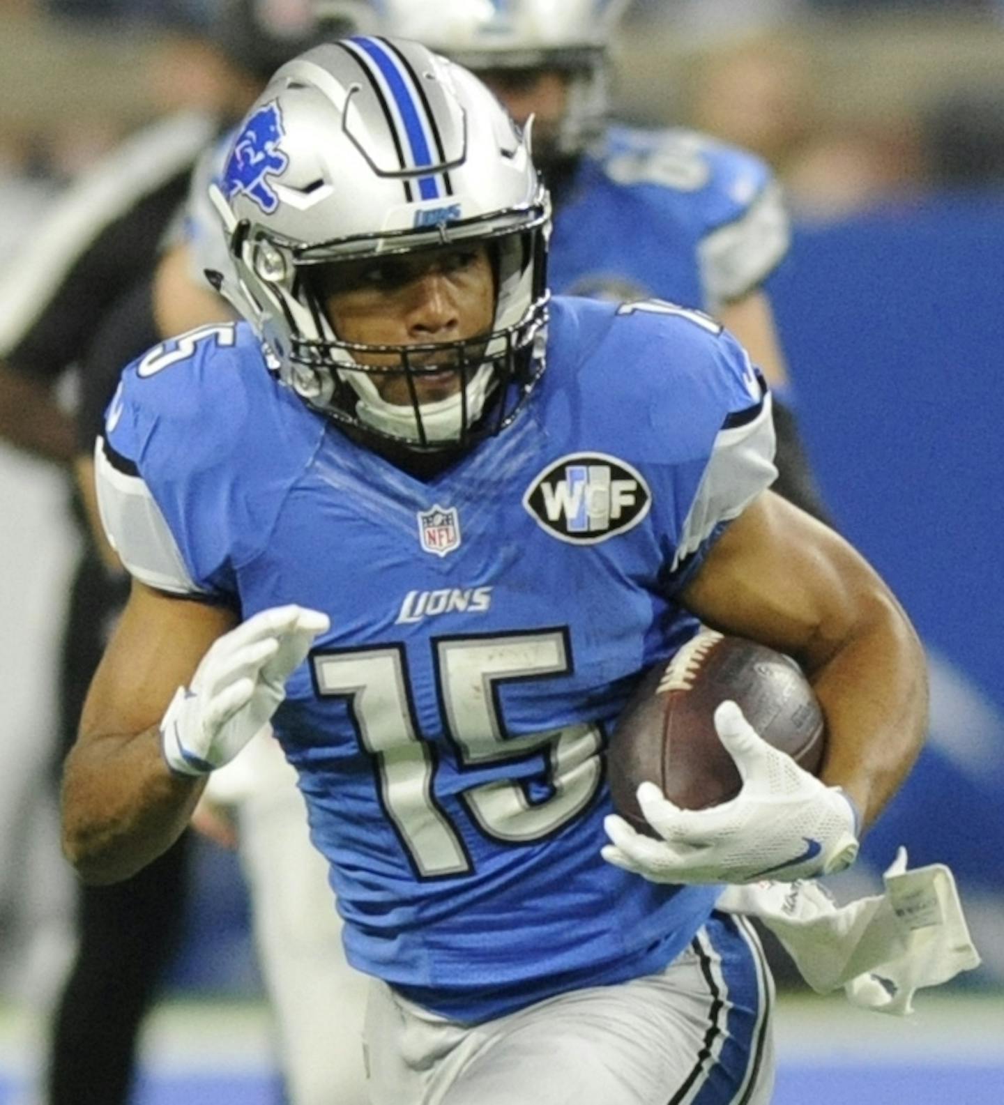 Detroit Lions wide receiver Golden Tate (15) pulls away from Minnesota Vikings strong safety Andrew Sendejo (34) during the first half of an NFL football game, Thursday, Nov. 24, 2016 in Detroit. (AP Photo/Jose Juarez)