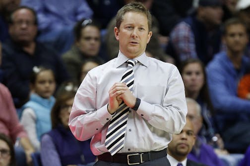 Furman head coach Niko Medved during the second half of an NCAA college basketball game against Connecticut in Storrs, Conn., Saturday, Nov. 21, 2015. Connecticut won 83-58. (AP Photo/Michael Dwyer) ORG XMIT: CTMD101
