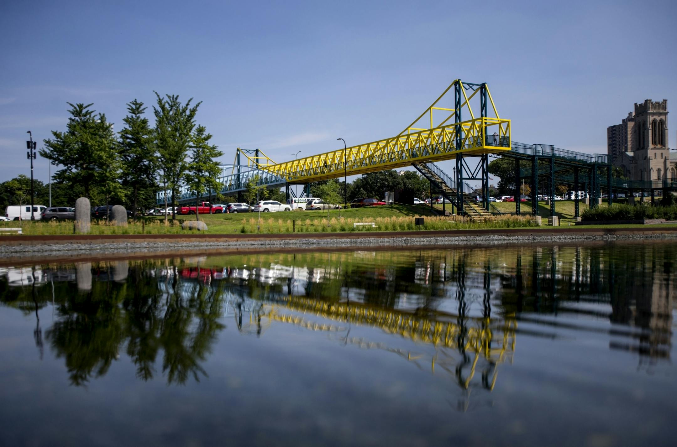The iconic bridge is reflected in the pond in the sculpture garden.