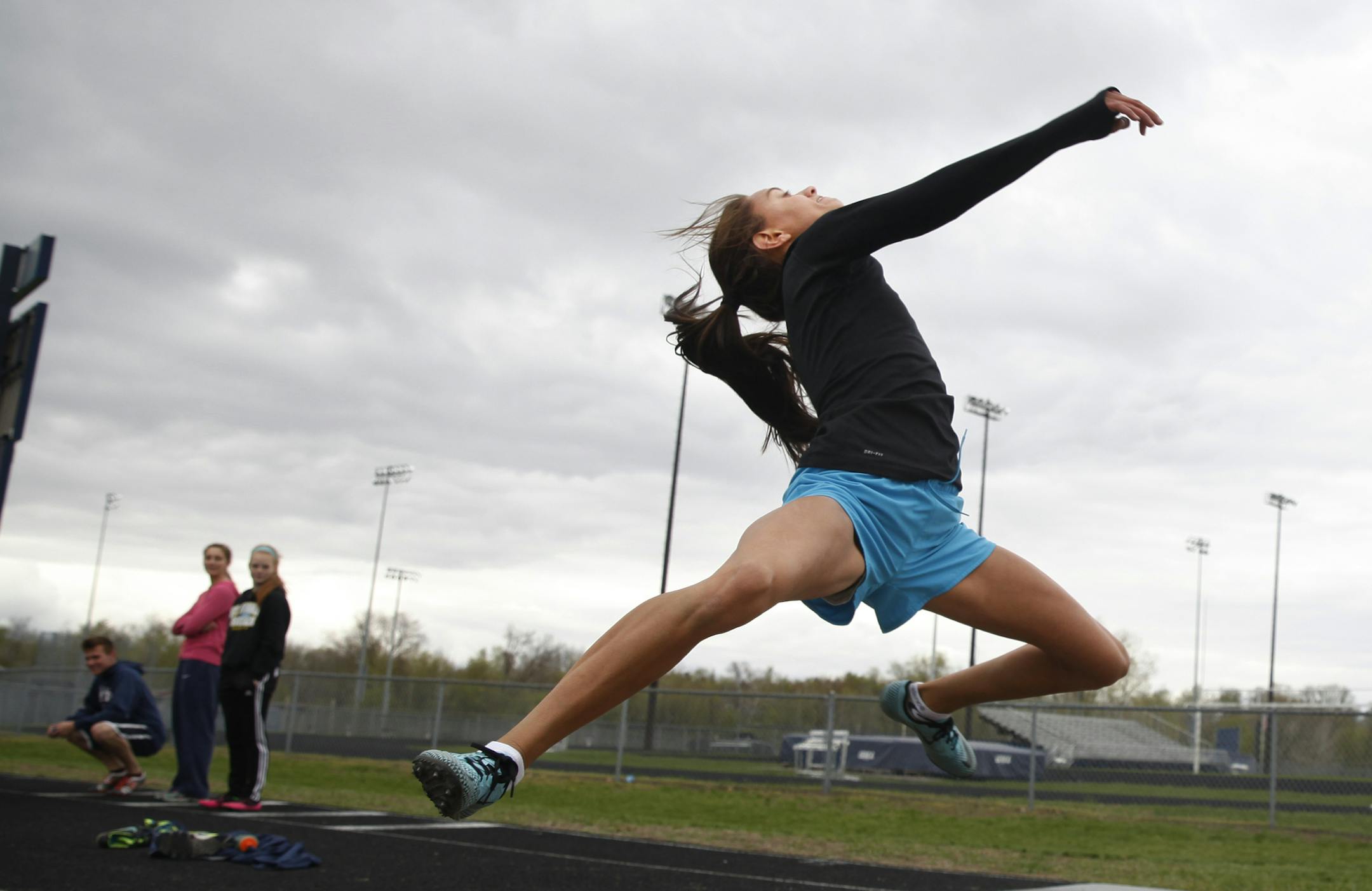 On May 15, 2014,at the Peace Officers at the track and field on the campus of St. Francis H.S. in St. Francis, jumper Bailey Demar, who despite a smaller stature has emerged as one of the state's best long and triple jumpers. Here she is demonstrating her triple jump form.]richard.tsong-taatarii/rtsong-taatarii@startribune.com