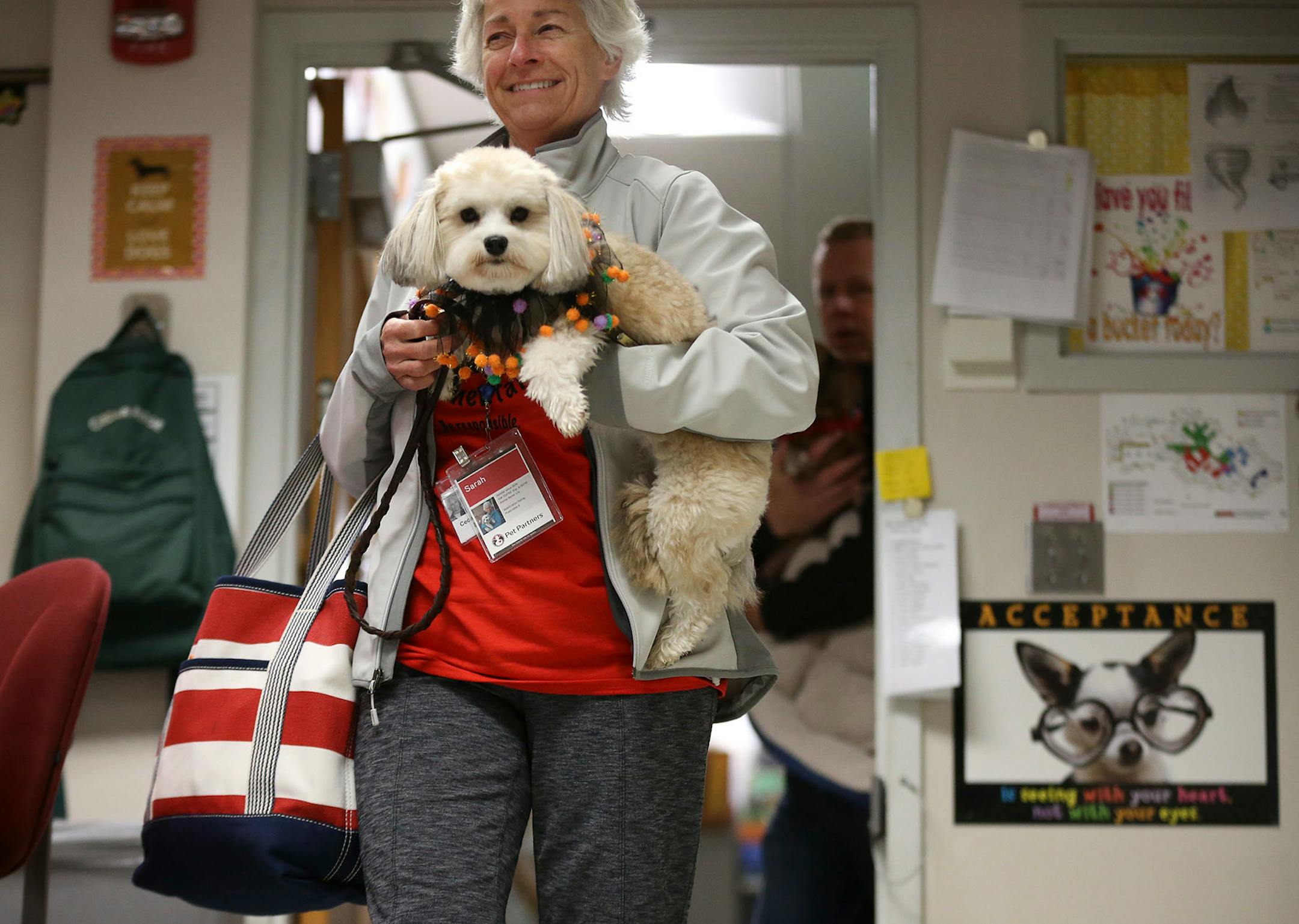 Sarah Goullaud and her dog "Lily" arrived at Cedar Ridge Elementary School to listen to the second graders read to Lily Monday October 30,2017 in Eden Prairie, MN.