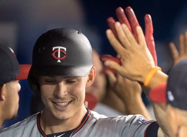 The Twins' Max Kepler got plenty of high-fives after hitting a two-run home run in the fifth inning against the Blue Jays in Toronto on Monday.