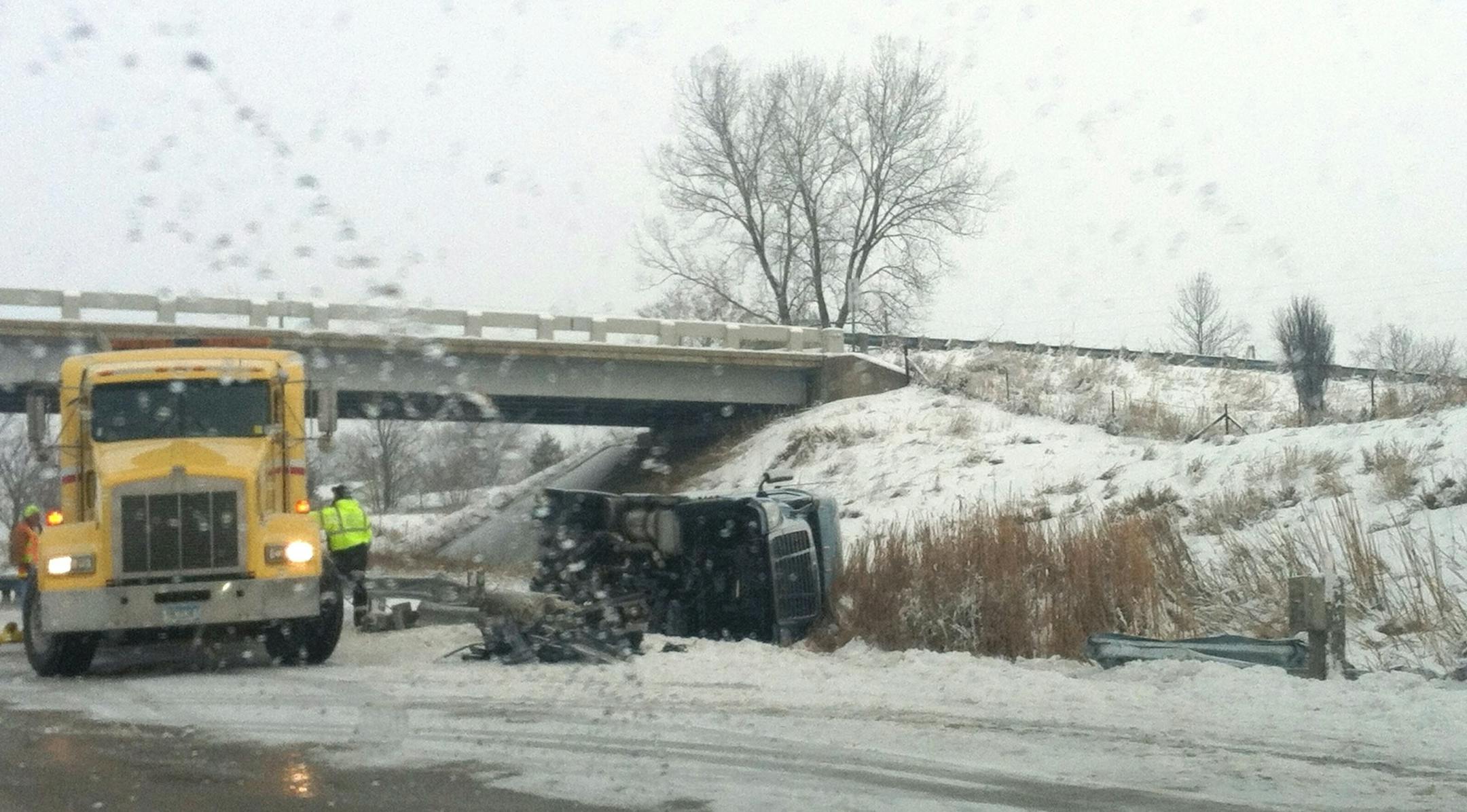 Officials worked to clear the scene of a crash on northbound I-35W near the Elko exit early Friday, Dec. 28, 2012.