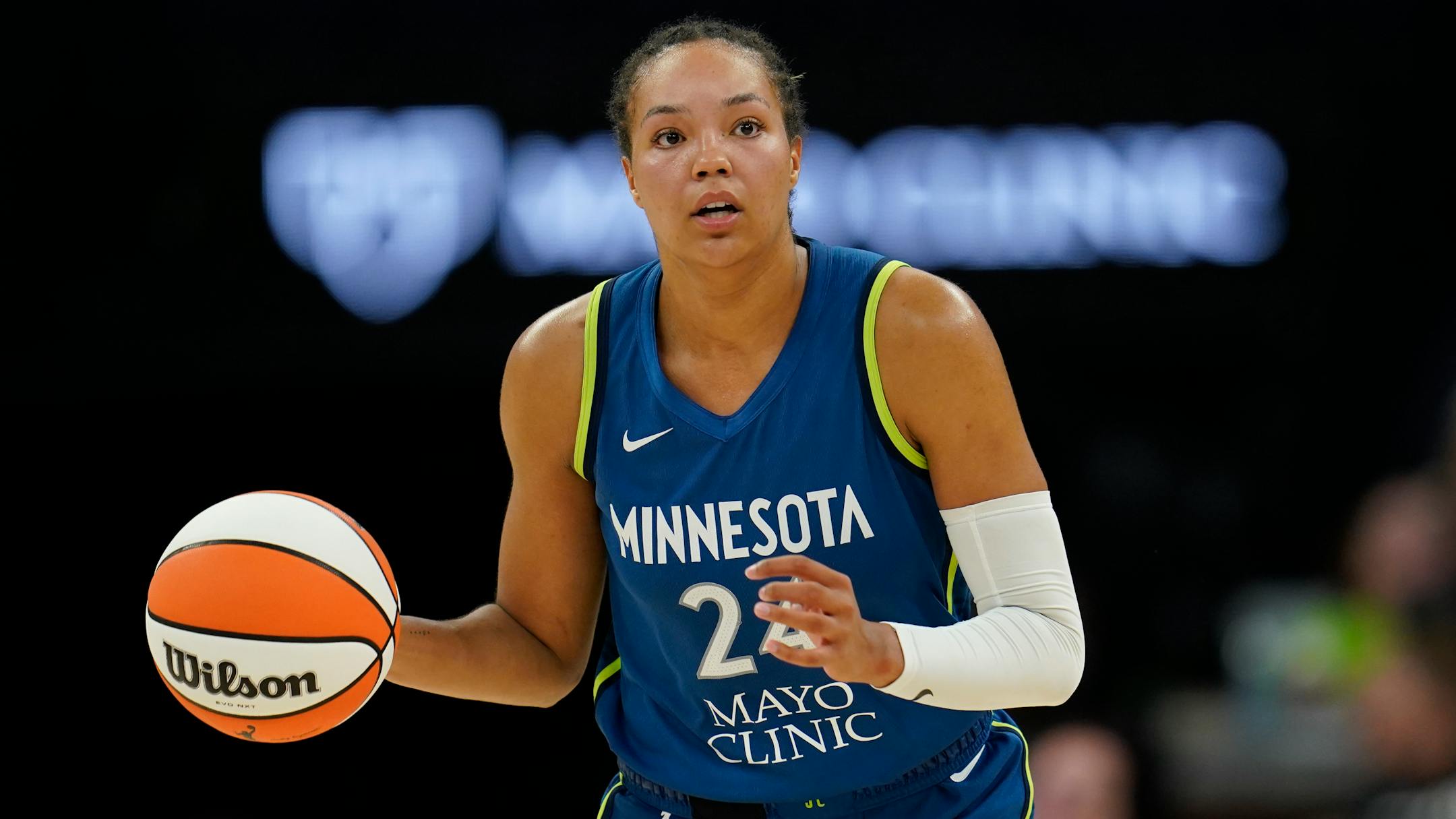 Minnesota Lynx forward Napheesa Collier dribbles down the court during the second half of a WNBA basketball game against the Seattle Storm, Tuesday, June 27, 2023, in Minneapolis. (AP Photo/Abbie Parr)