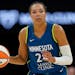 Minnesota Lynx forward Napheesa Collier dribbles down the court during the second half of a WNBA basketball game against the Seattle Storm, Tuesday, J