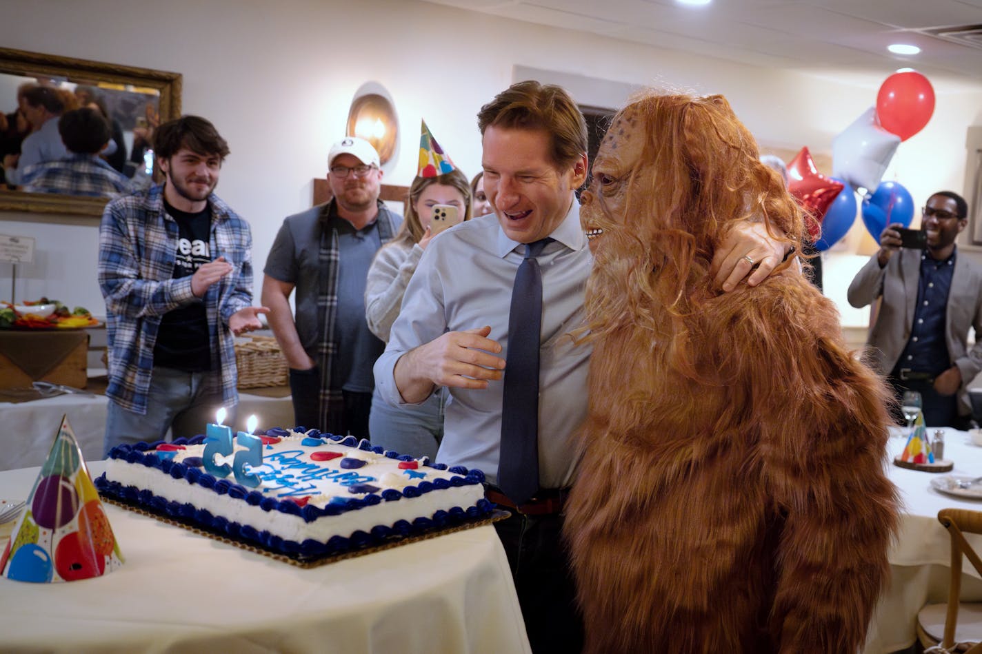 Dean Phillips staffers threw him a private surprise 55th birthday party Saturday night in a Concord NH restaurant.  Sasquatch - featured in Phillips current TV ads - delivered the cake Saturday, Jan. 20, 2024  Concord, New Hampshire.    ] GLEN STUBBE • glen.stubbe@startribune.com