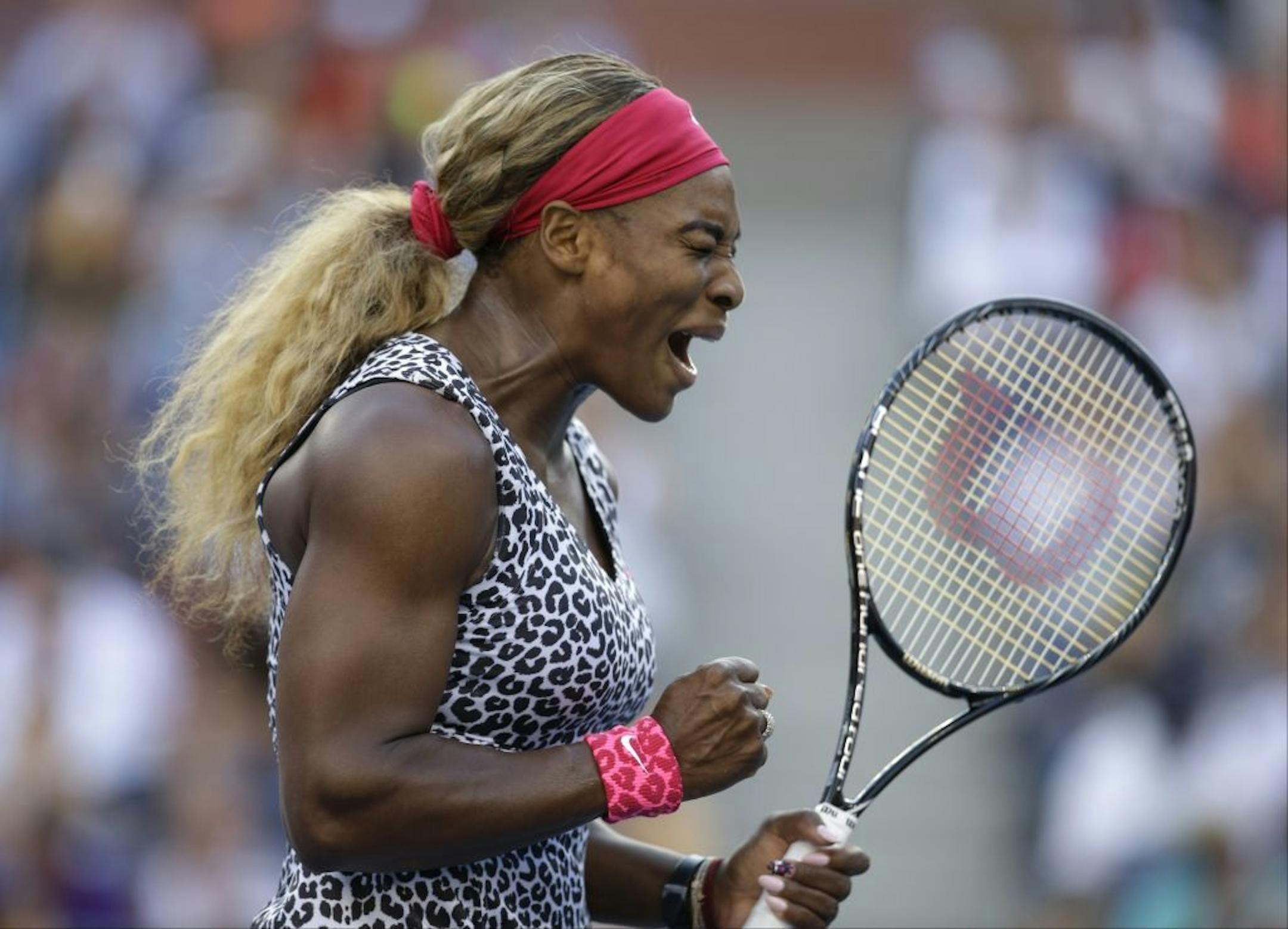 Serena Williams, reacts after a shot against Caroline Wozniacki, of Denmark, during the championship match of the 2014 U.S. Open tennis tournament, Sunday, Sept. 7, 2014, in New York.