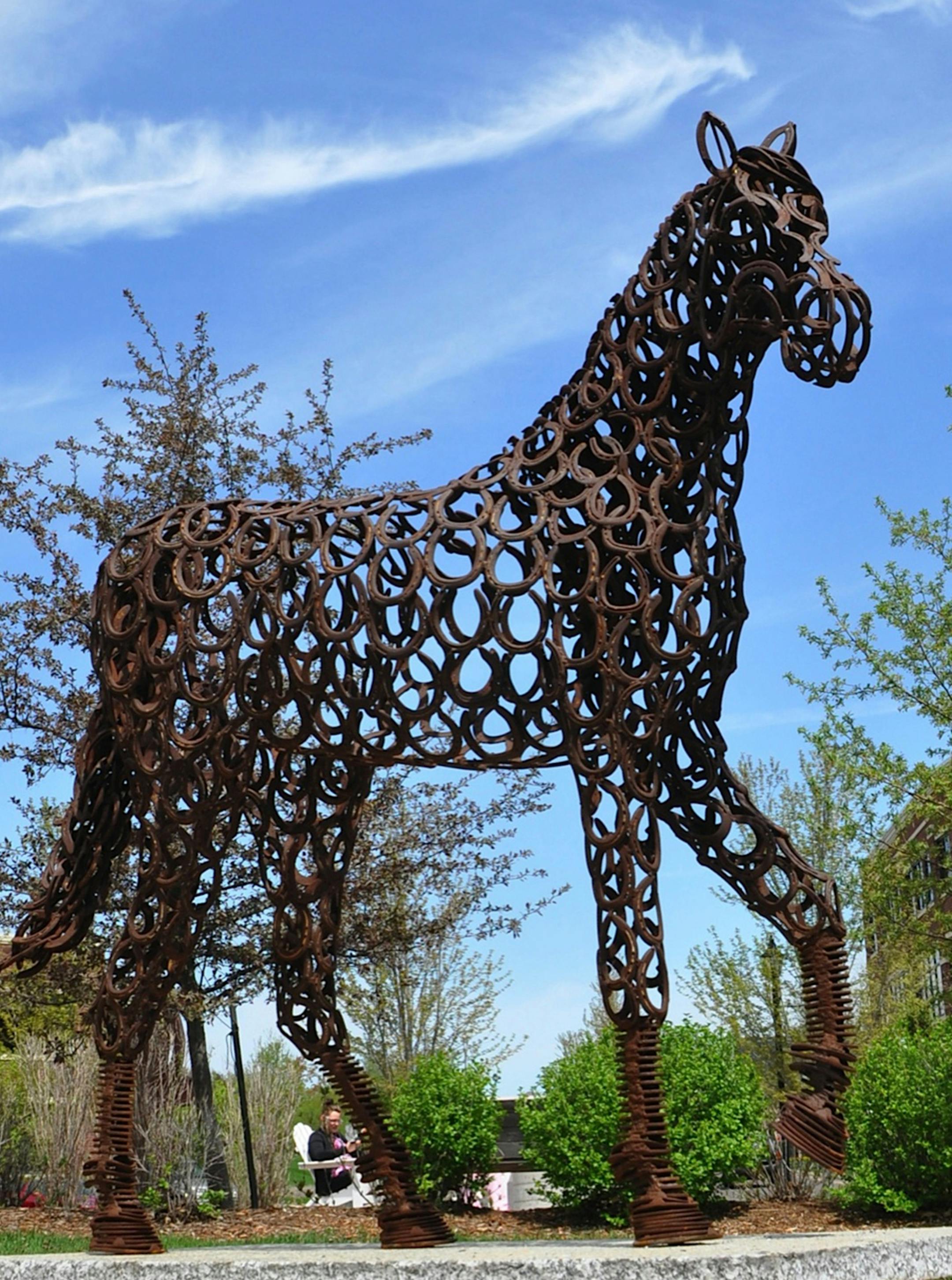 Kristen Piersa Kregel, Bloomington, won First Place and a $1,000 stipend in the People&#x201a;&#xc4;&#xf4;s Choice Awards for her sculpture, Number Seven, a life-sized steel horse made from real horseshoes. The sculpture is located at Grandview Square Park. The Edina Public Art Committee sponsors the annual exhibit. Photo by Barbara La Valleur