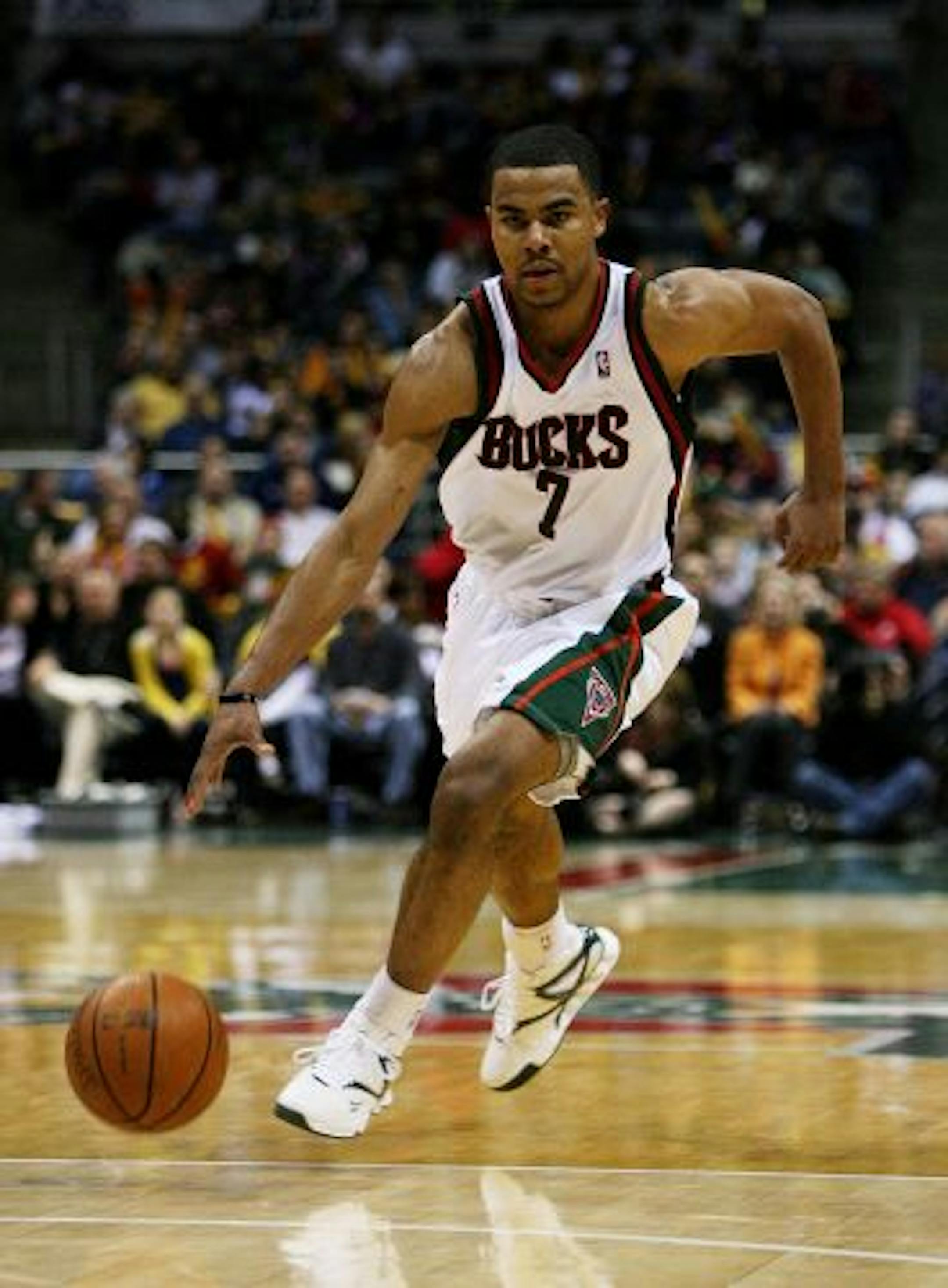 MILWAUKEE - FEBRUARY 09: Ramon Sessions #7 of the Milwaukee Bucks brings the ball upcourt against the Houston Rockets on February 9, 2009 at the Bradley Center in Milwaukee, Wisconsin. The Bucks defeated the Rockets 124-112.