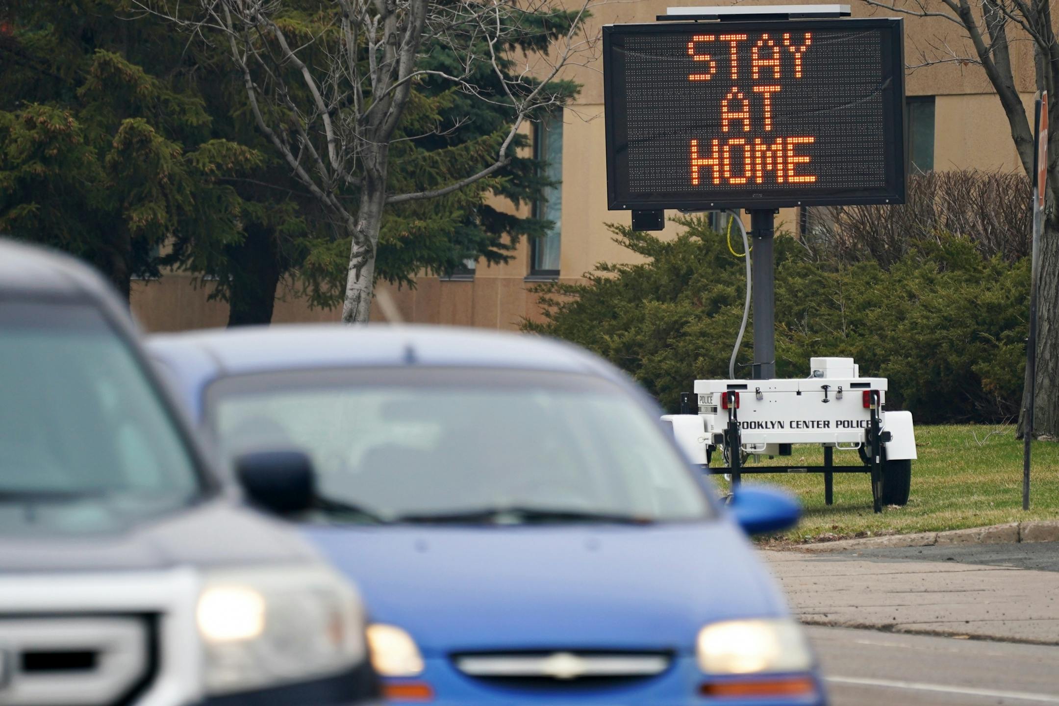 A sign put up by the Brooklyn Center Police Department reminded motorists of Gov. Tim Walz's stay-at-home order.