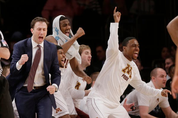 Minnesota head coach Richard Pitino reacts with his team during the first half of an NCAA college basketball game against Florida State Seminoles in t