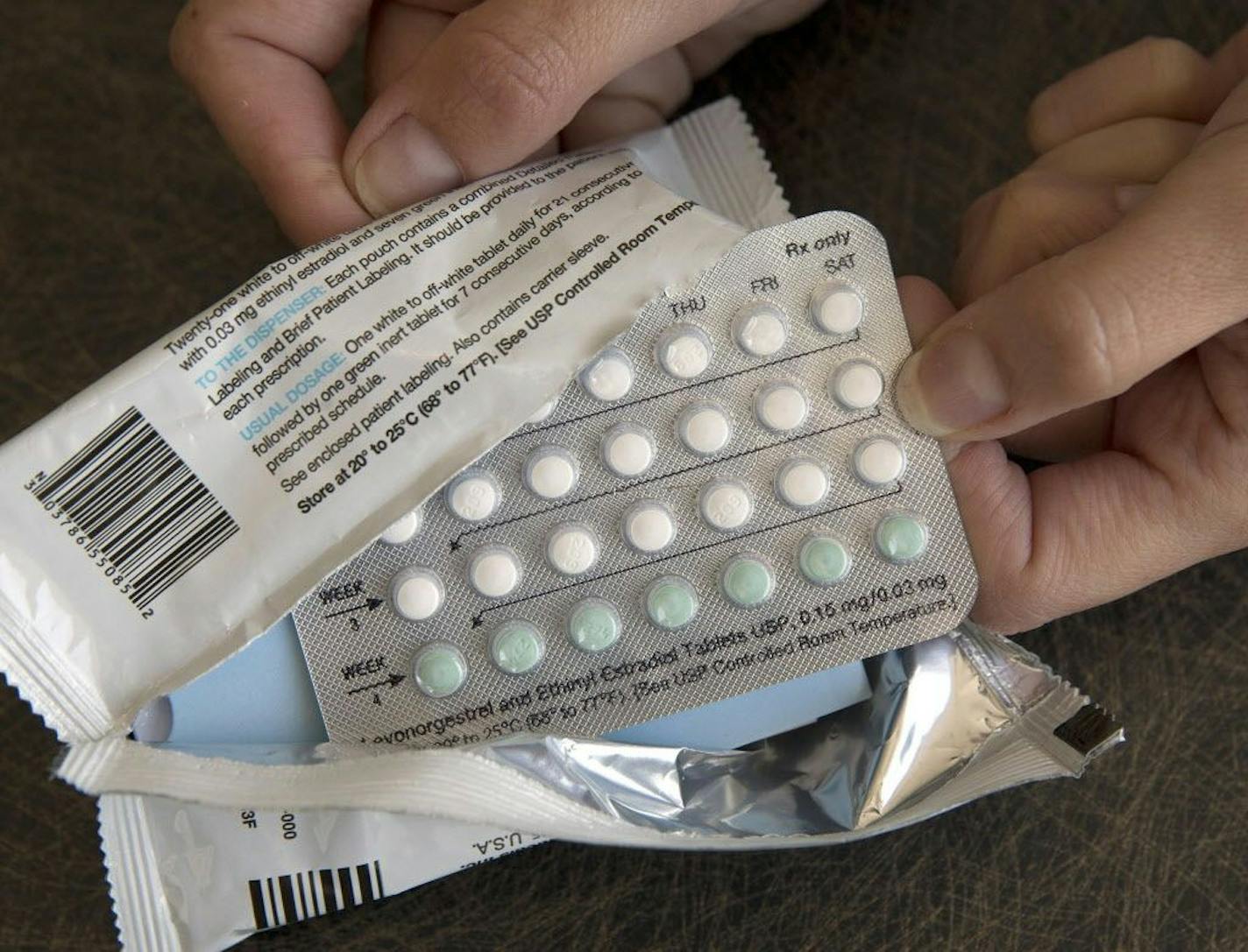 FILE - In this Aug. 26, 2016, file photo, a one-month dosage of hormonal birth control pills is displayed in Sacramento, Calif. A U.S. appeals court Thursday, Dec. 13, 2018, blocked rules by the Trump administration allowing more employers to opt out of providing women with no-cost birth control.