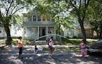 July 29, 2006: Children jump rope on 26th Street and Colfax Avenue N. on a hot Saturday afternoon. From left; Lanika Taylor, Destiny Applewhite, Rahis