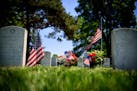 Flowers left for a loved one at Fort Snelling. ] GLEN STUBBE * gstubbe@startribune.com Thursday, May 26, 2016 Feature on Fort Snelling National Cemete