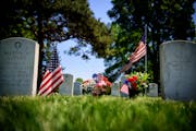 Flowers left for a loved one at Fort Snelling. ] GLEN STUBBE * gstubbe@startribune.com Thursday, May 26, 2016 Feature on Fort Snelling National Cemete