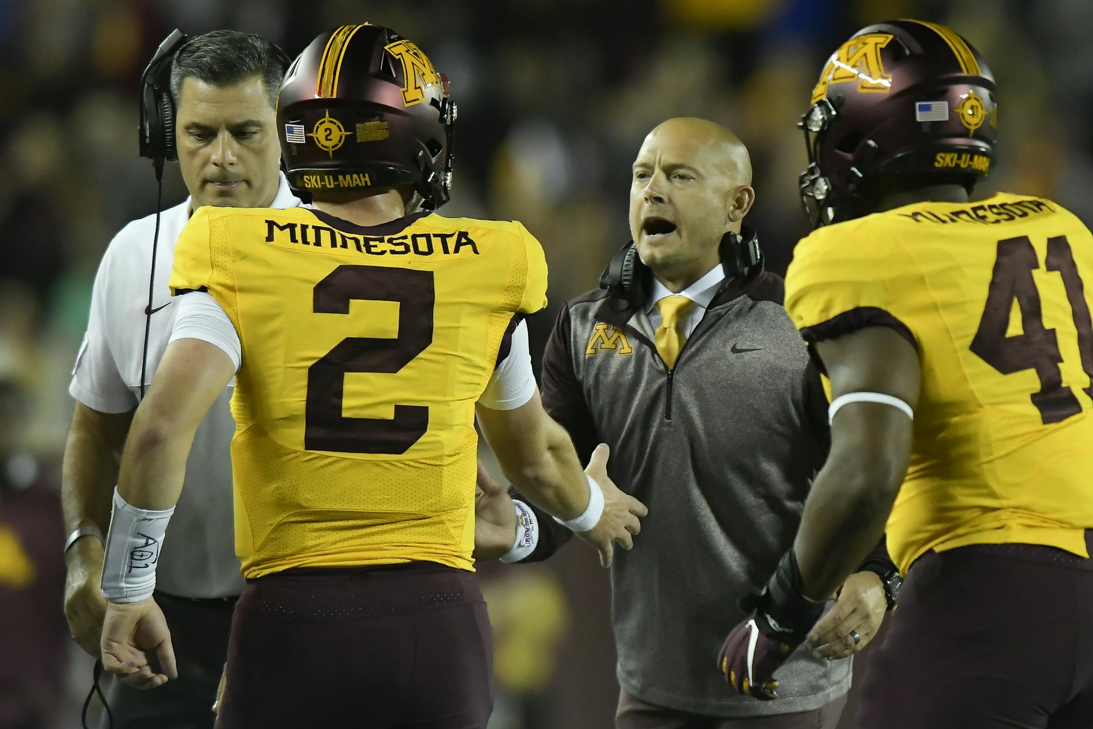 Minnesota Gophers head coach PJ Fleck celebrated with quarterback Tanner Morgan (2) after a second quarter touchdown against the South Dakota State Jackrabbits. ] Aaron Lavinsky • aaron.lavinsky@startribune.com The Minnesota Gophers played South Dakota State Jackrabbits on Thursday, Aug. 29, 2019 at TCF Bank Stadium in Minneapolis, Minn. ORG XMIT: MIN1908292130093970