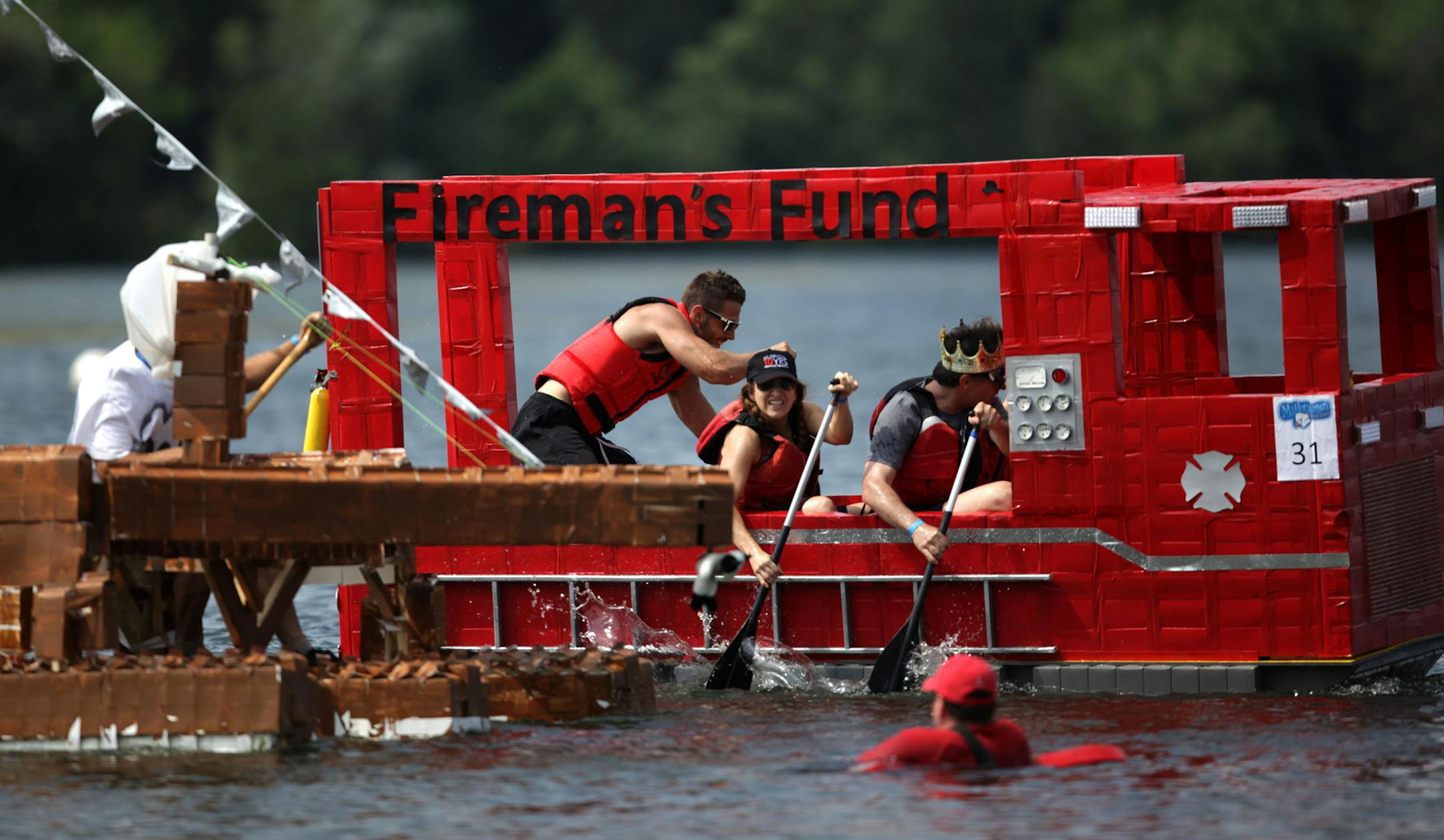 The Best Days of Summer Aquatennial Milk Carton Boat race was held Sunday afternoon at Thomas Beach on Lake Calhoun. ]The annual aquatennial continues through July 26th. MONICA HERNDON monica.herndon@startribune.com Minneapolis, MN 07/20/14 ORG XMIT: MIN1407201752011754
