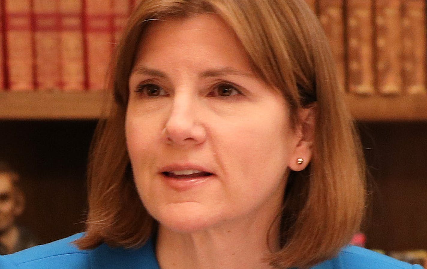 Minnesota Attorney General Lori Swanson talked with her spokesperson Ben Wogsland as she reviewed evidence in the case of President Donald Trump's immigration ban targeting seven predominantly Muslim countries Friday in her office. ] ANTHONY SOUFFLE &#xef; anthony.souffle@startribune.com Minnesota Attorney General Lori Swanson reviewed evidence in the case of President Donald Trump's immigration ban targeting seven predominantly Muslim countries Friday, Feb. 10, 2017 in her office at the State C