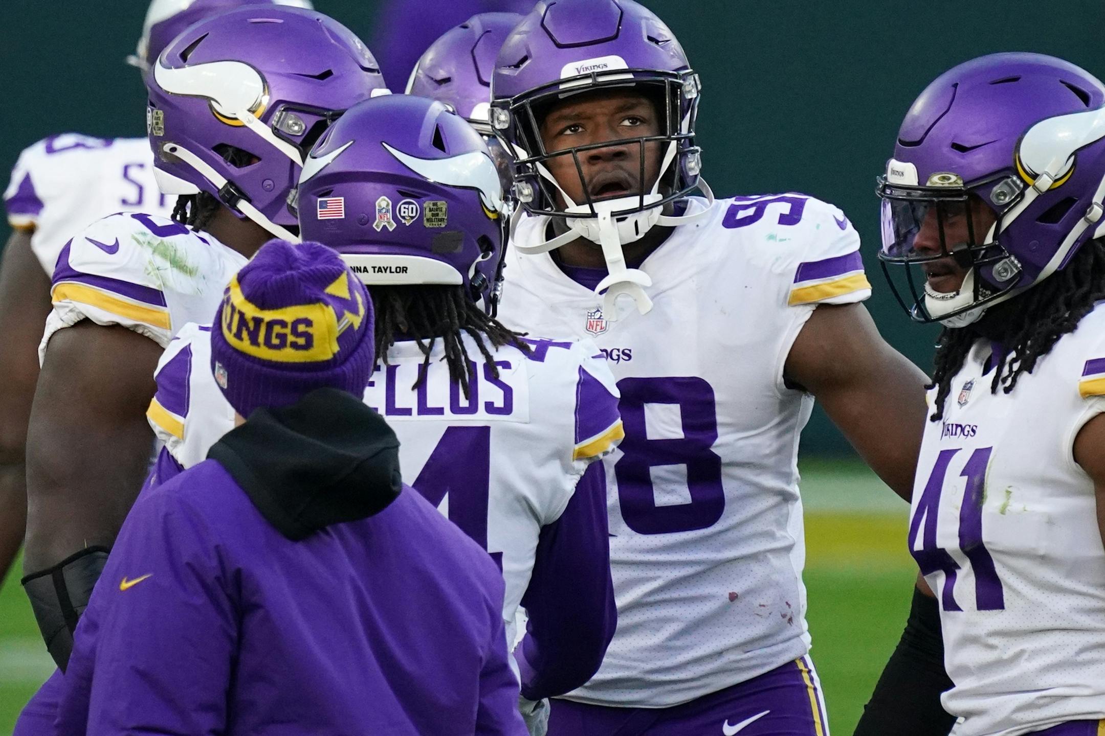 Minnesota Vikings defensive end D.J. Wonnum (98) watched the reply after he sacked Green Bay Packers quarterback Aaron Rodgers (12) in the final few seconds in the fourth quarter.