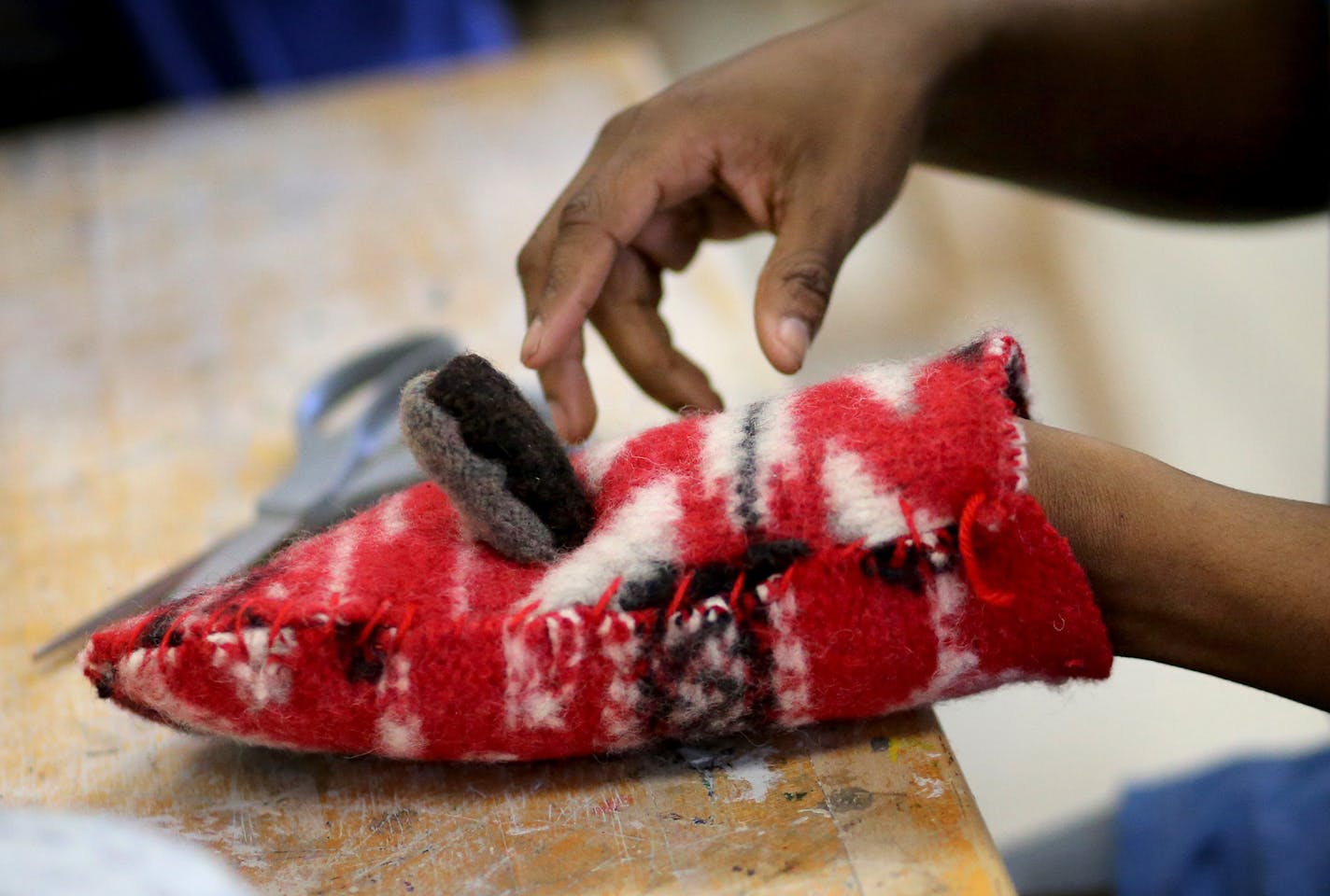 In art class, student Carter Favors makes his own mittens at the School of Environmental Studies in Apple Valley Thursday, Feb. 5, 2015, in Apple Valley, MN.](DAVID JOLES/STARTRIBUNE)djoles@startribune.com The School of Environmental Studies in Apple Valley, otherwise known as the "zoo school," is having its 20 year anniversary this year. **Carter Favors ,cq