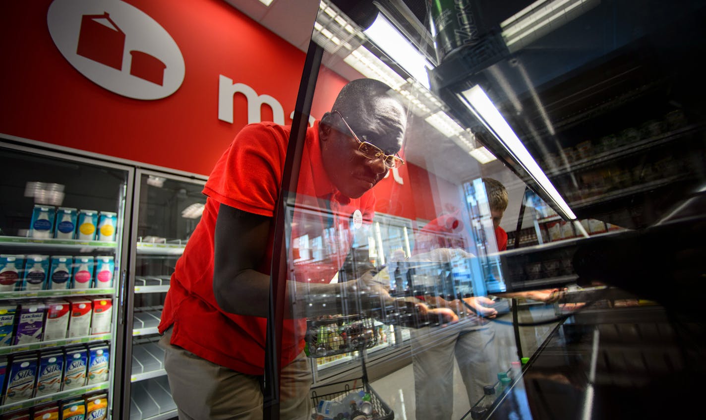 Target workers assembled a soft drink display case in the retailer&#x2019;s first TargetExpress store, which is opening on Wednesday in Dinkytown.