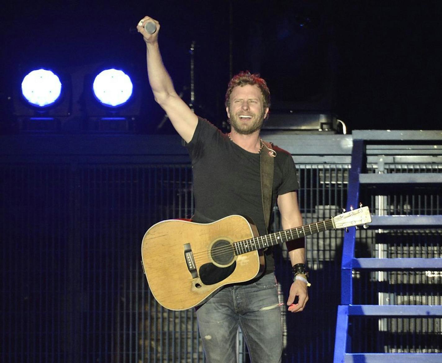 Singer Dierks Bentley performs on day 2 of the 2013 Stagecoach Music Festival at the Empire Polo Club on Saturday, April 27, 2013 in Indio, Calif. (Photo by Dan Steinberg/Invision/AP) ORG XMIT: MIN2013060413132159