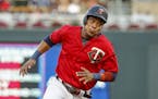 Minnesota Twins' Jorge Polanco rounds third base en route to scoring against the Chicago White Sox on a single by Nelson Cruz in the first inning of a