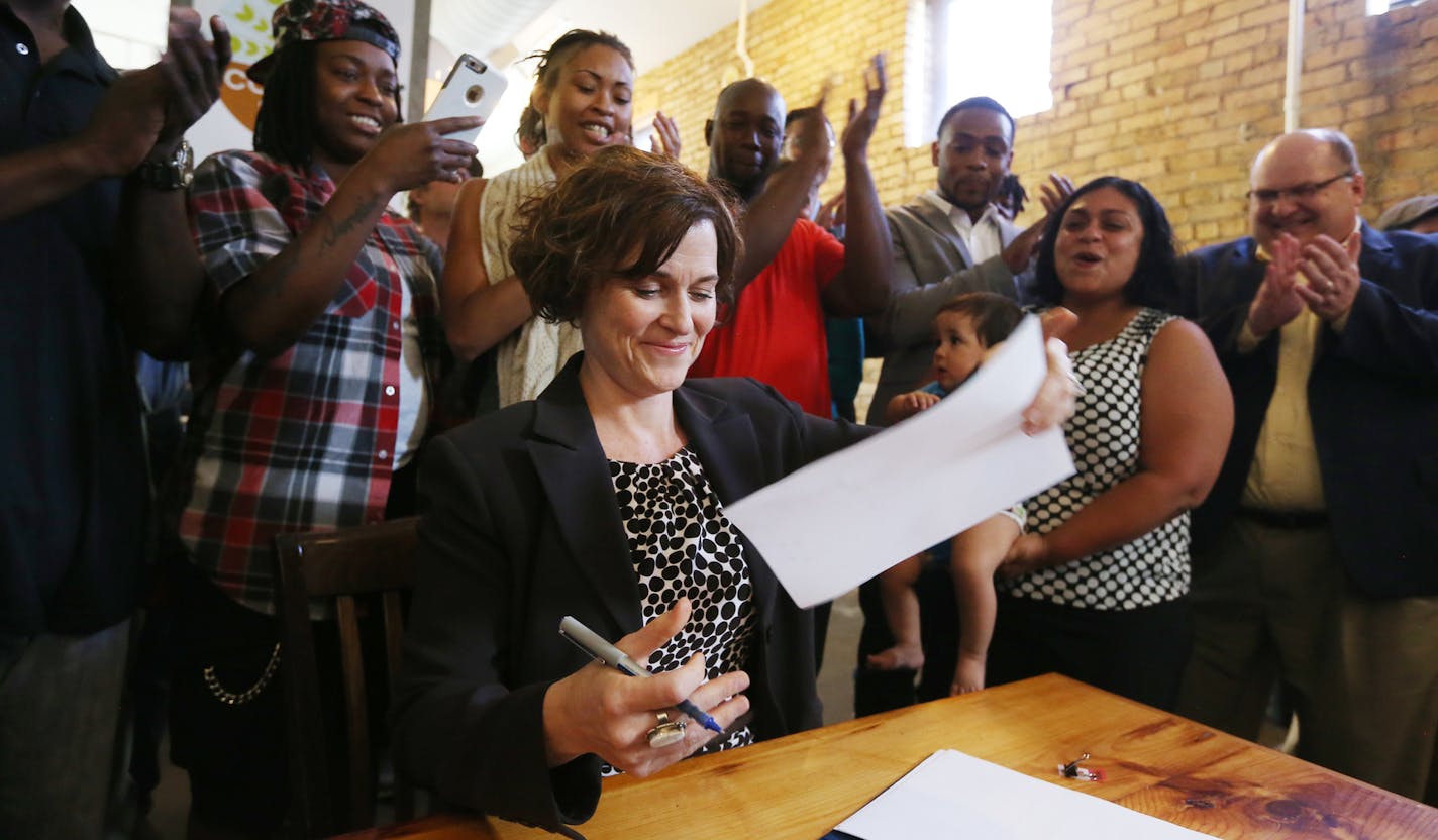 In May 2016, then-Minneapolis Mayor Betsy Hodges signed the landmark earned sick and safe time ordinance at the Common Roots Cafe.