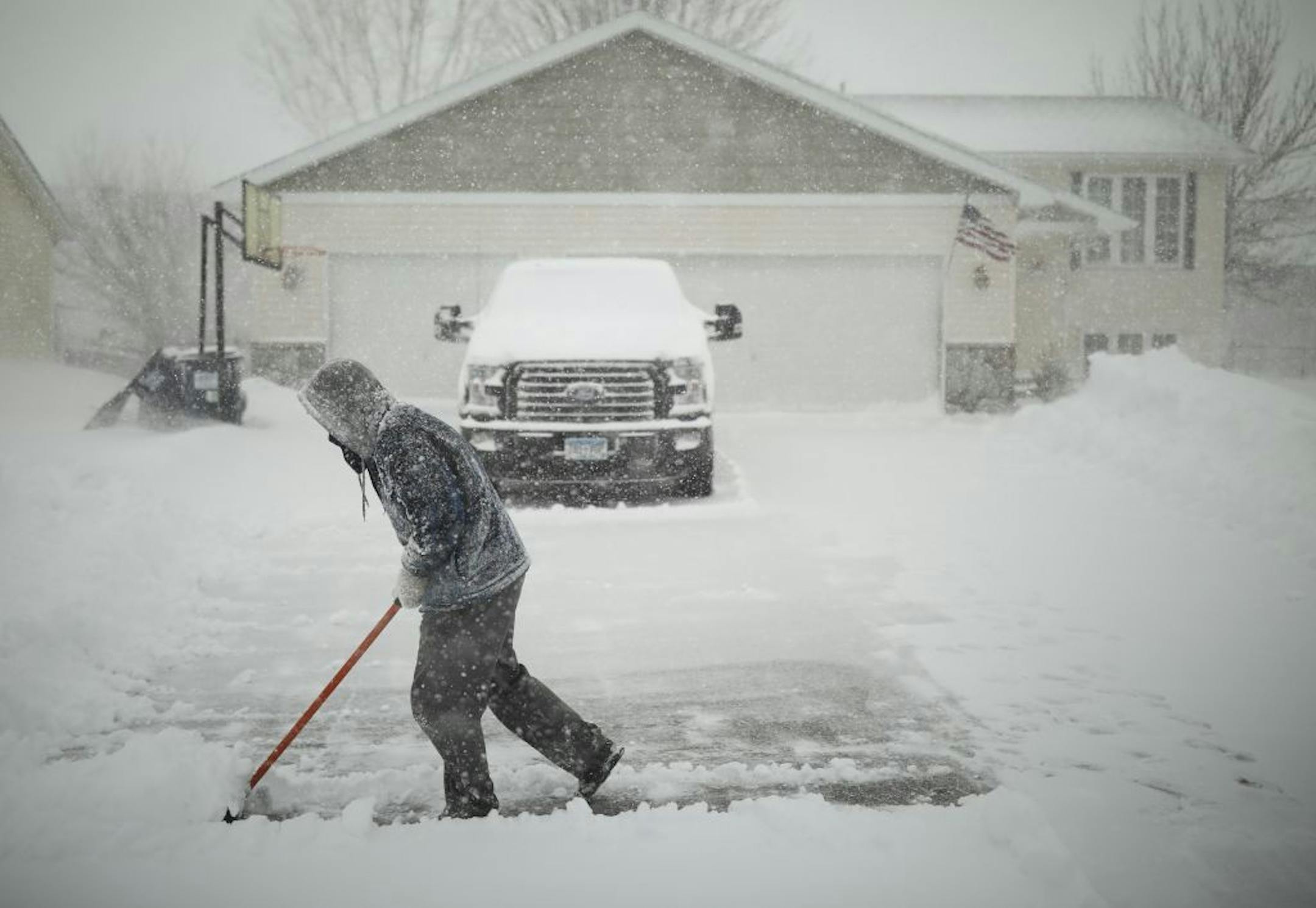 Skylar Milne thought he'd try to get ahead of the falling snow and clear his driveway in Elko New Market.
