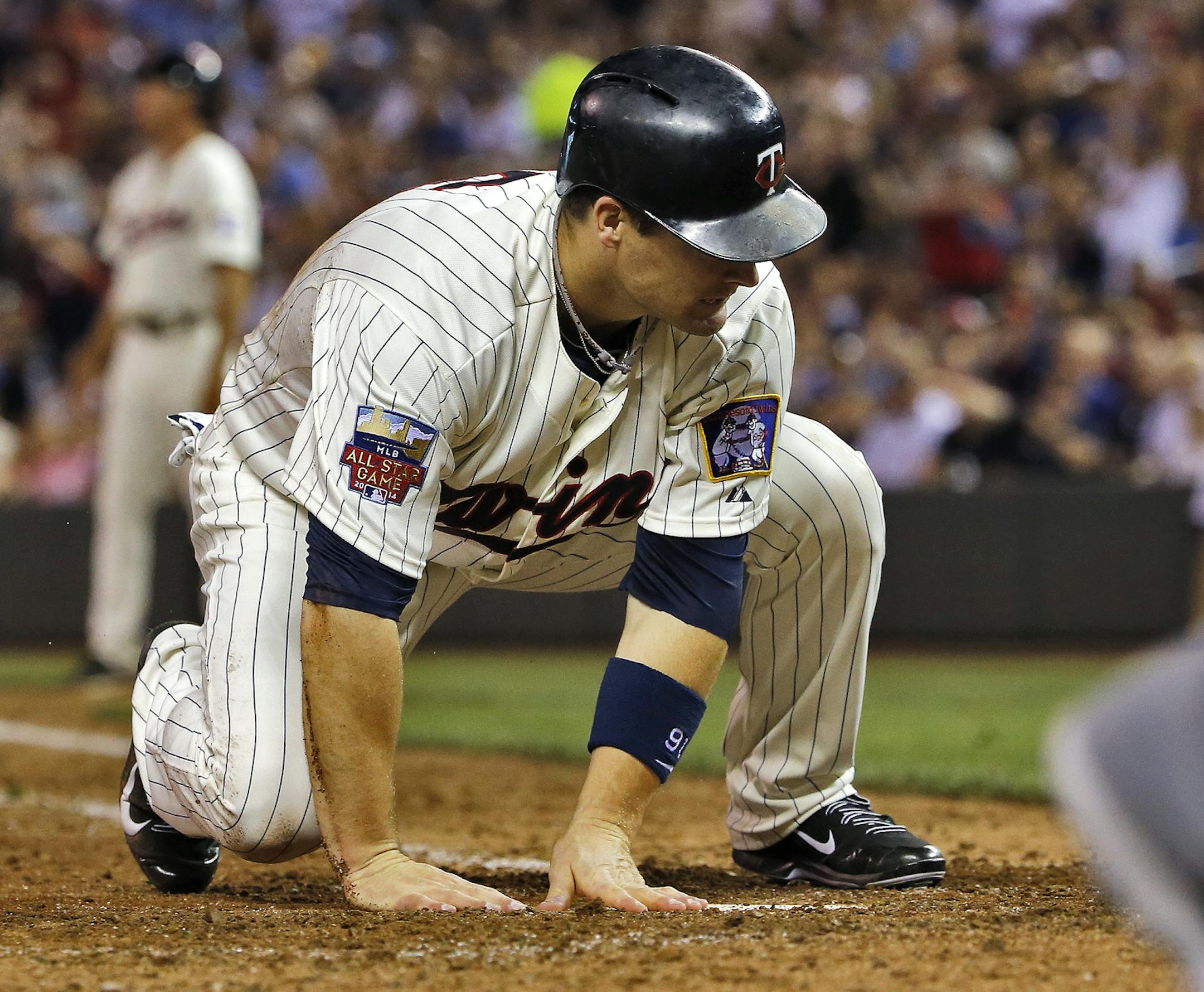Josh Willingham crossed home plate with the winning run against Milwaukee.