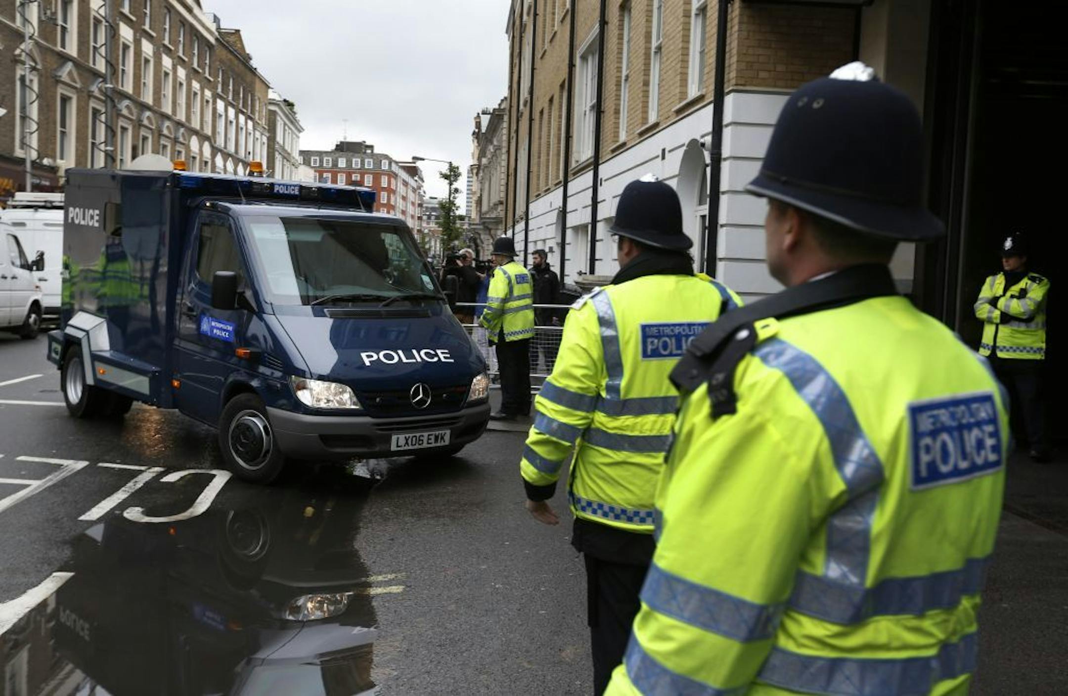 A police van believed to be transporting 22-year-old Michael Adebowale, a suspect in the murder of British soldier Lee Rigby, arrives at Westminster Magistrates Court in central London, Thursday, May 30, 2013.