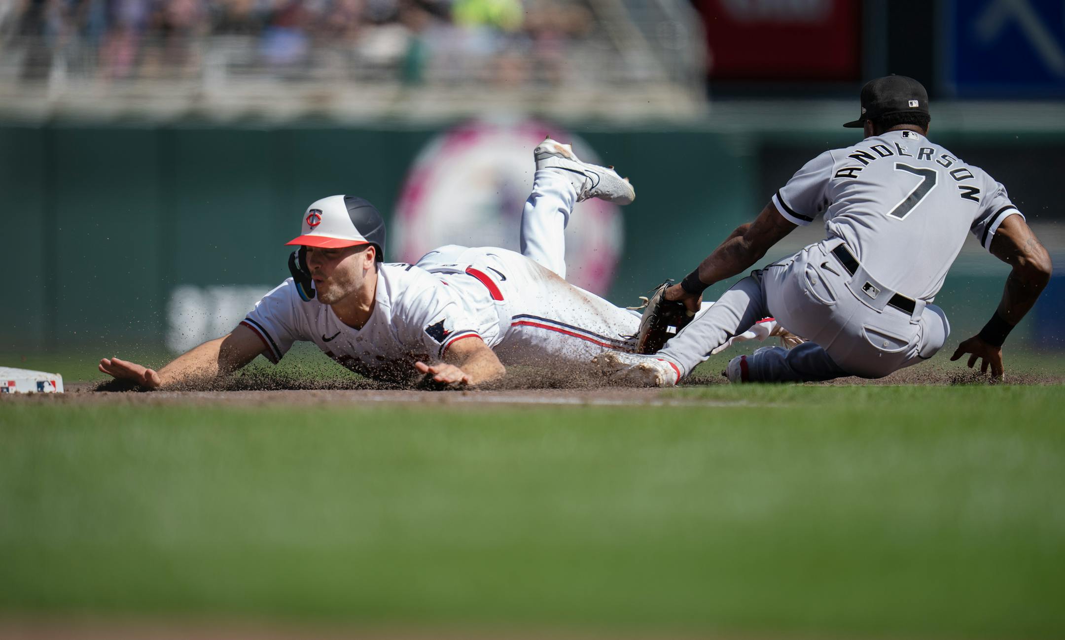 Twins right fielder Matt Wallner was safe a third after he collided with Chicago White Sox shortstop Tim Anderson (7) during a rundown in the fourth inning.