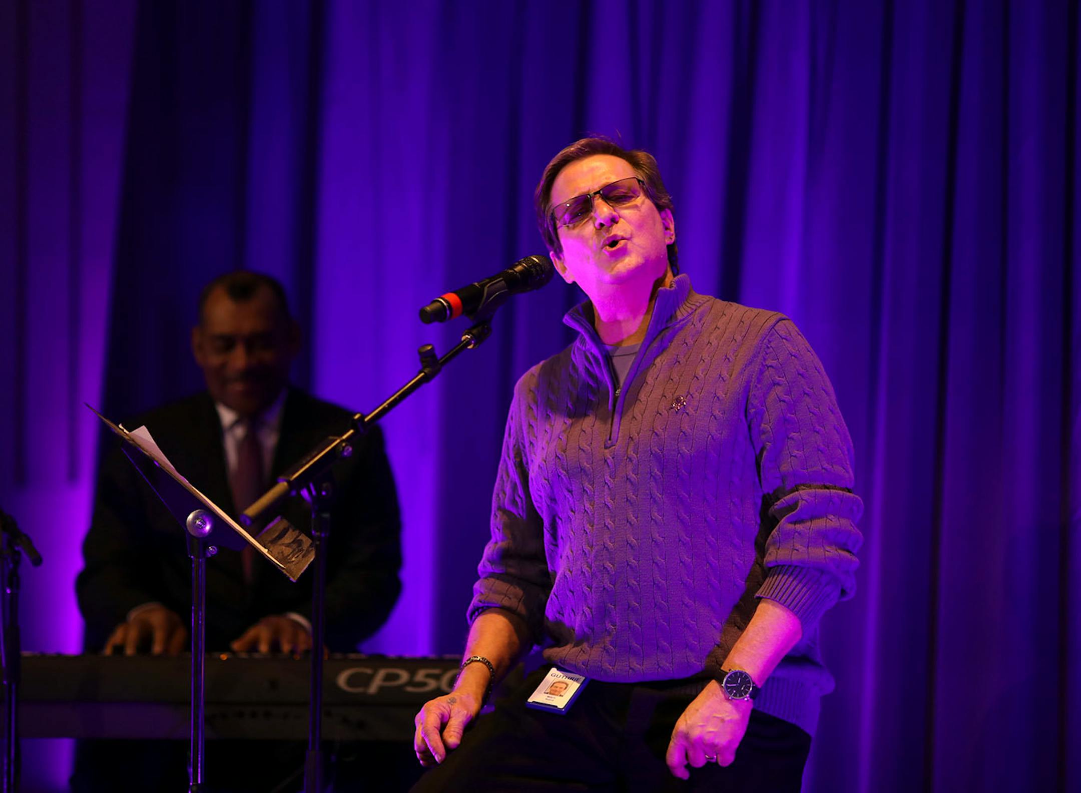 Accompanied by Fred Steele on keys, Guthrie production employee Mitch Baird sang a song in tribute to Prince.
