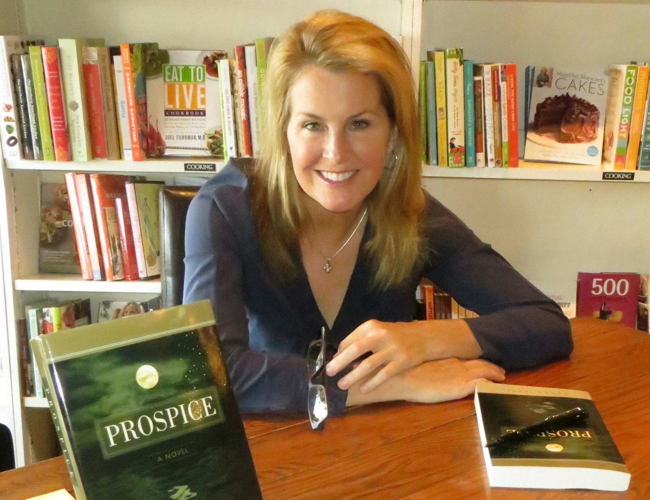 Edina resident Karen Kelly, author of the novel "Prospice," is pictured at an October book signing at The Bookcase of Wayzata. Kelly's debut novel, a work of historical fiction, recounts one family's triumphs and tribulations in the aftermath of World War II.