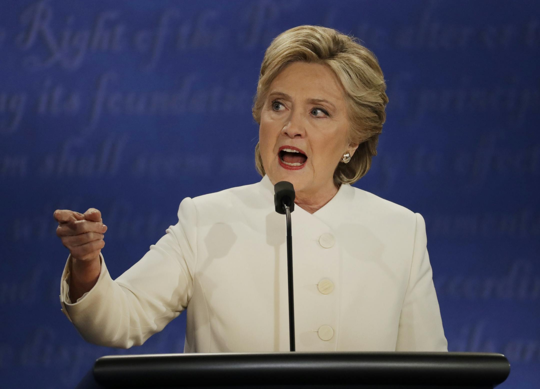 Democratic presidential nominee Hillary Clinton speaks to Republican presidential nominee Donald Trump during the third presidential debate at UNLV in Las Vegas, Wednesday, Oct. 19, 2016.